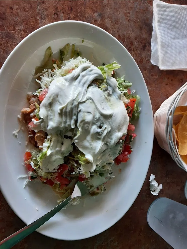 Chicken Tostada with Sour Cream and Pico De Gallo
